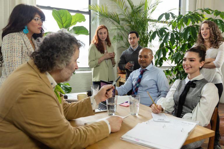 A diverse team of professionals collaborating in a modern office setting