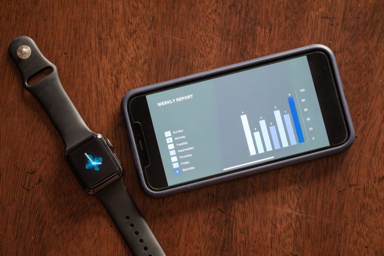 Apple Watch showing heart rate and fitness metrics