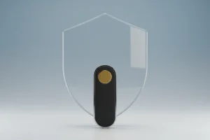 Sleek security key before a translucent shield, symbolizing SSO convenience with adaptive MFA protection.